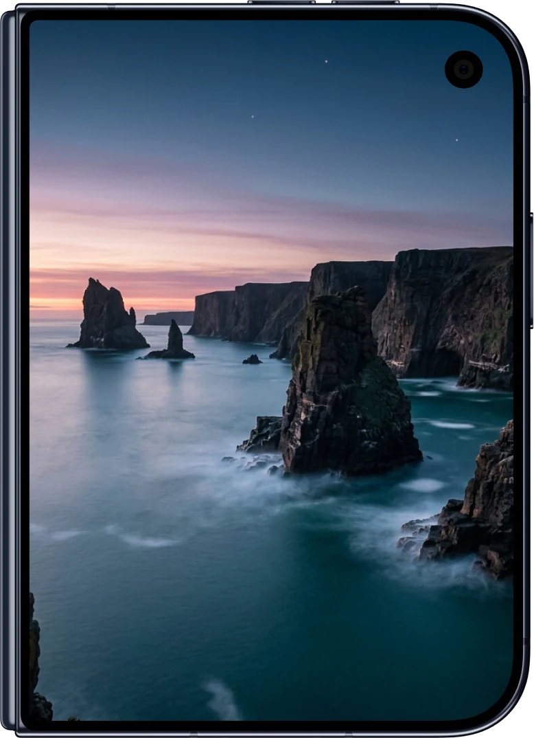 Sea stacks wallpaper on the outer screen of a folded iPhone Duo